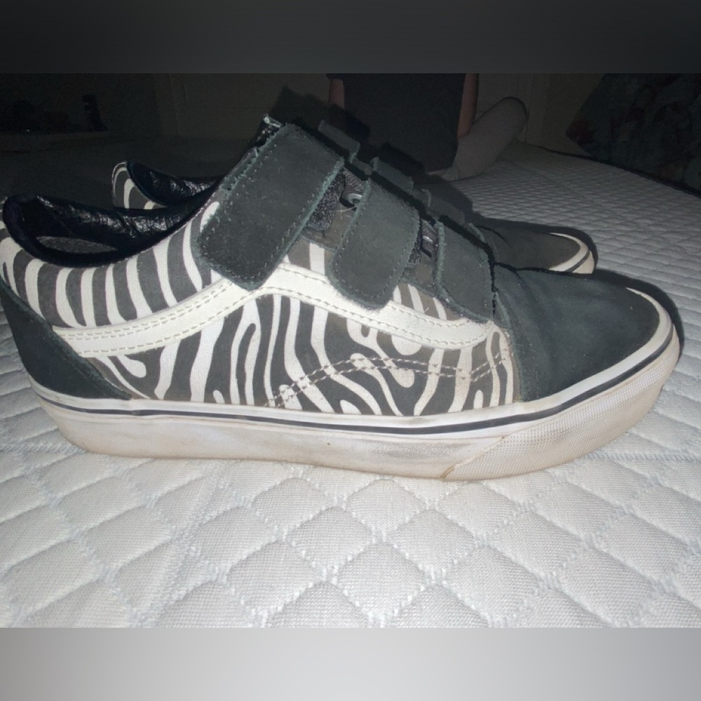 Woman’s 8.5 zebra Velcro Vans